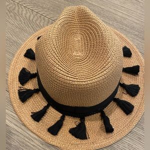 Women’s beach or sun hat with black tassels